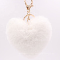 BMSP05 Llavero con forma de corazón de piel de fantasía multicolor Faux Pom Pom